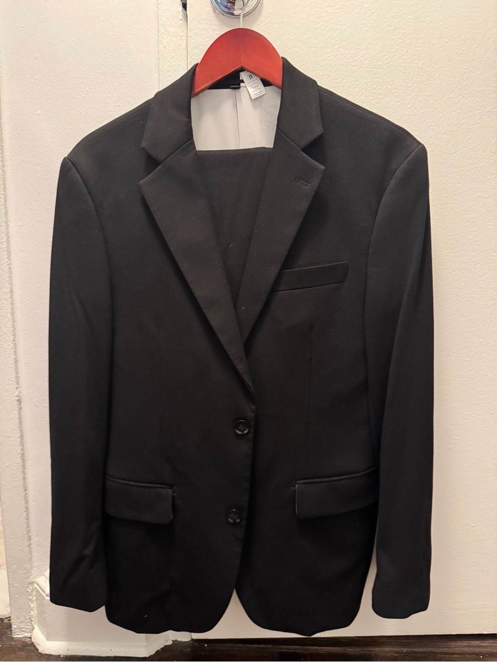 Full two-piece men’s stretch black suit from State and Liberty